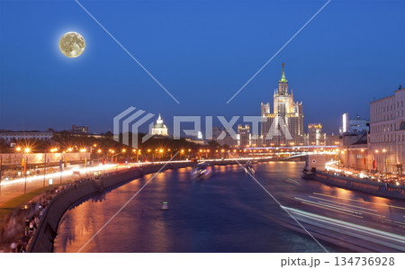 Kotelnicheskaya Embankment Building at night with the super moon, Moscow, Russia-- is one of seven stalinist skyscrapers laid down in September, 1947 and completed in 1952. 134736928