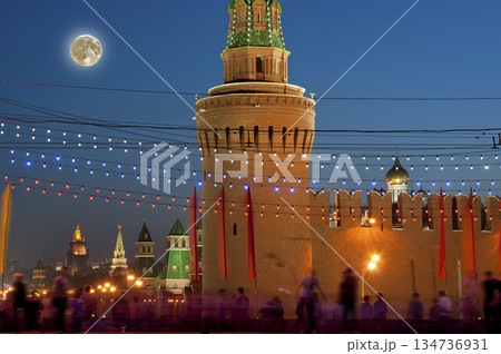 Night view of the Moscow Kremlin, Russia (the most popular view). Against the background of a beautiful sky with the moon Night view of the Moscow Kremlin, Russia (the most popular view). Against the background of a beautiful sky with the moon 134736931