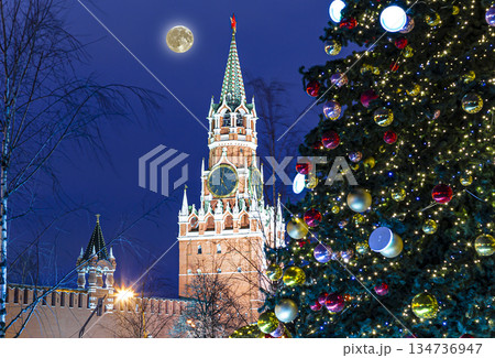 Christmas (New Year holidays) decoration in Moscow (at night with the super moon), Russia-- The Spasskaya Tower. Journey to Christmas, Moscow seasons 134736947