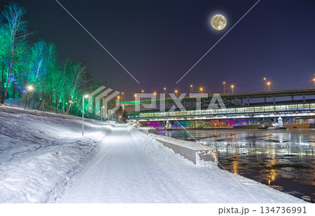 Christmas (New Year holidays) decoration in Moscow (at night, with the super moon), Russia-- Andreevskaya (Andreevsky) embankment Christmas (New Year holidays) decoration in Moscow (at night, with the super moon), Russia-- Andreevskaya (Andreevsky) embankment 134736991