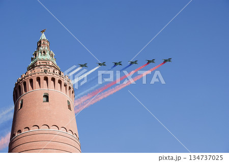 Moscow Kremlin, Russia -- Victory Day celebration (WWII), and Russian military aircraft with painted russian flag, Russia 134737025