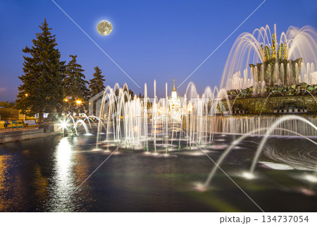 Fountain Stone Flower (with the super moon ) at VDNKh in Moscow. VDNKh (called also All-Russian Exhibition Center) is a permanent general-purpose trade show in Moscow, Russia 134737054