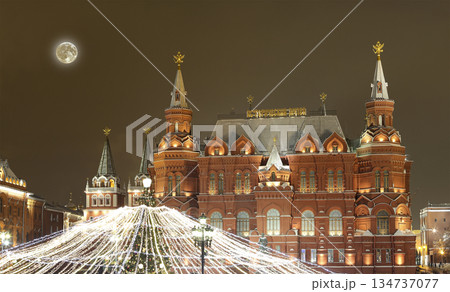 Christmas (New Year holidays) illumination and State Historical Museum (It is written in Russian) at night (with the super moon), near the Kremlin in Moscow, Russia Christmas (New Year holidays) illumination and State Historical Museum (It is written in Russian) at night (with the super moon), near the Kremlin in Moscow, Russia 134737077