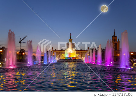 Fountain Stone Flower (at night with the super moon) at VDNKh in Moscow. VDNKh (called also All-Russian Exhibition Center) is a permanent general-purpose trade show in Moscow, Russia 134737106
