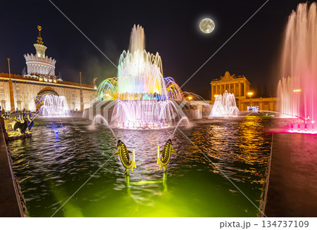 Fountain Stone Flower (at night with the super moon) at VDNKh in Moscow. VDNKh (called also All-Russian Exhibition Center) is a permanent general-purpose trade show in Moscow, Russia 134737109