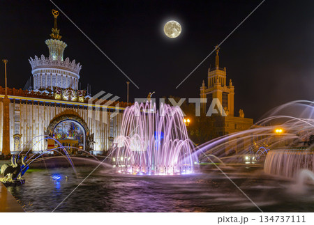 Fountain Stone Flower (with the super moon ) at VDNKh in Moscow. VDNKh (called also All-Russian Exhibition Center) is a permanent general-purpose trade show in Moscow, Russia 134737111