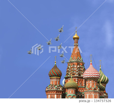 Temple of Basil the Blessed and Russian military aircraft in the sky,  Air parade in honor of Victory Day celebration (WWII), Red Square, Moscow, Russia 134737326
