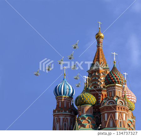 Temple of Basil the Blessed and Russian military aircraft in the sky, Air parade in honor of Victory Day celebration (WWII), Red Square, Moscow, Russia Temple of Basil the Blessed and Russian military aircraft in the sky, Air parade in honor of Victory Day celebration (WWII), Red Square, Moscow, Russia 134737327