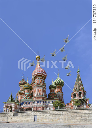 Temple of Basil the Blessed and Russian military aircraft in the sky,  Air parade in honor of Victory Day celebration (WWII), Red Square, Moscow, Russia 134737330