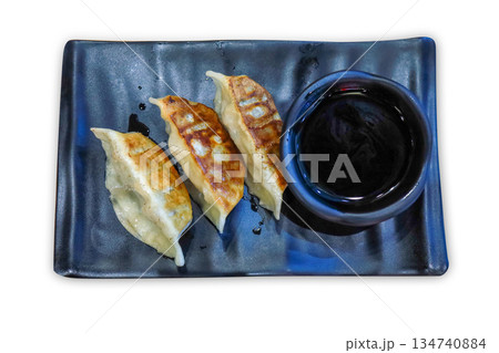 Top view of Gyoza in black plate, focus selective Top view of Gyoza in black plate, focus selective 134740884