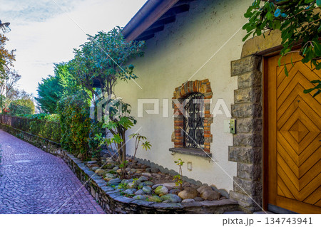 Part of some house on Olive trail in Lugano suburb on coaastline of Lugano lake. 134743941