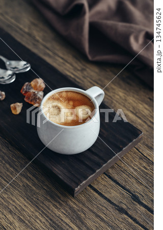 Two cups  of coffee on wooden tray 134745624