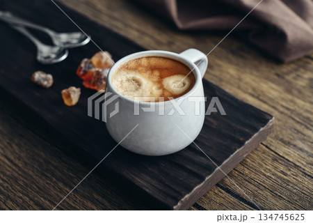 Two cups  of coffee on wooden tray 134745625
