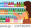 商品棚の前で商品を選ぶ女性 134746409