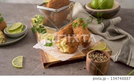 Cod dumplings or bolinhos de bacalhau 134748887