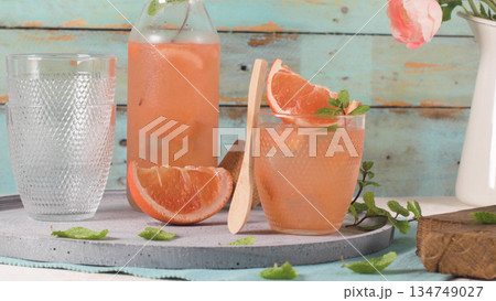 Grapefruit juice with rosemary Grapefruit juice with rosemary 134749027