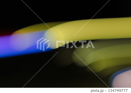 Blurred Light Streaks with Slow Shutter Speed Effect, Abstract Background with Vibrant Colors, Creative Visuals for Artistic Design 134749777