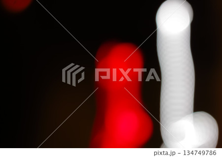 Blurred Light Trails with Slow Shutter Speed Photography Effect, Red and White Lights on Dark Background, Motion Blur for Abstract Visual Effect 134749786