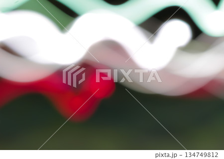 Blurred Light Trails with Slow Shutter Speed Effect, Abstract Red, White, and Green Motion Lines for a Dynamic Background Design Blurred Light Trails with Slow Shutter Speed Effect, Abstract Red, White, and Green Motion Lines for a Dynamic Background Design 134749812