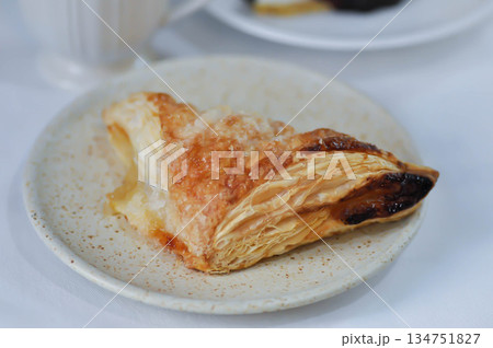 puff pastry , tart or pie with pineapple sauce stuffed puff pastry , tart or pie with pineapple sauce stuffed 134751827