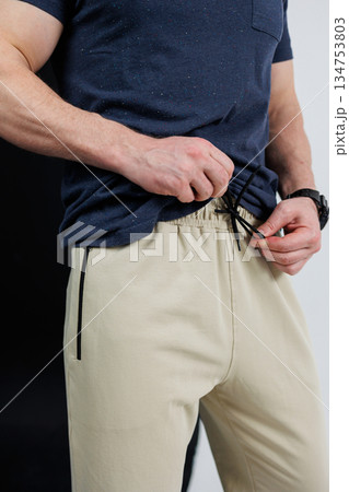 Stylish Casual Wear Comfortable Drawstring Pants paired with a Fitted TShirt designed specifically for the Modern Male, ensuring both style and comfort for everyday activities and casual outings Stylish Casual Wear Comfortable Drawstring Pants paired with a Fitted TShirt designed specifically for the Modern Male, ensuring both style and comfort for everyday activities and casual outings 134753803