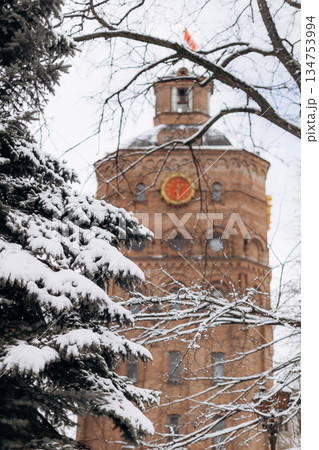 A Historic Tower Surrounded by a Stunning Winter Wonderland A Captivating SnowCovered Scene Showcasing Remarkable Architectural Beauty in a Snowy Landscape, Perfect for a Winter Day 134753994