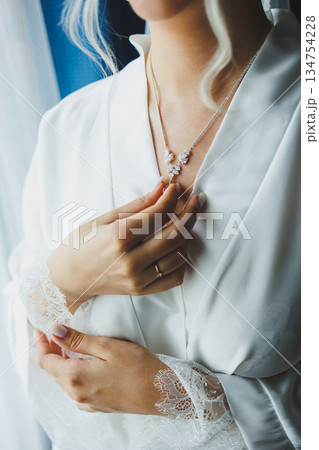 An Elegant Bride is Preparing for Her Beautiful Wedding Day, Filled With Love and Joyful Moments 134754228