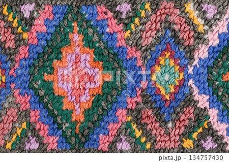 Traditional geometric cross-stitch embroidery pattern texture background Traditional geometric cross-stitch embroidery pattern texture background 134757430