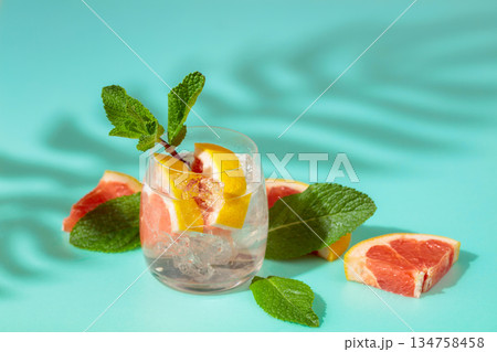Summer refreshing drink with ice and grapefruit. Summer refreshing drink with ice and grapefruit. 134758458