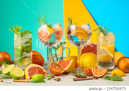 Refreshing summer cocktails with ingredients on a bright colorful background. Refreshing summer cocktails with ingredients on a bright colorful background. 134758473