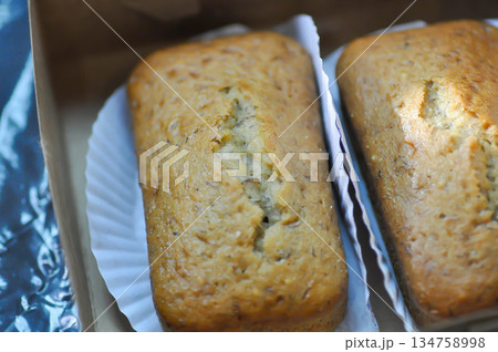 banana cake or banana bread or almond bread , loaf of bread 134758998