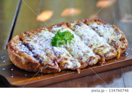 bread pizza , ham and cheese pizza or cheese pizza or Italian pizza 134760746