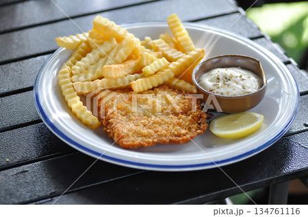 fish and chip or fried fish with French fries and dip 134761116