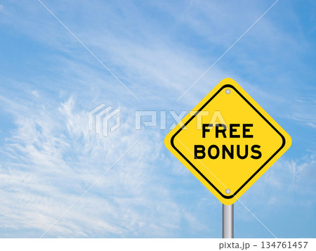 Yellow transportation sign with word free bonus on blue color sky background 134761457