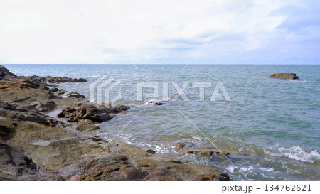 Rocky Sea Coastline with Small Waves and Clear Horizon 134762621