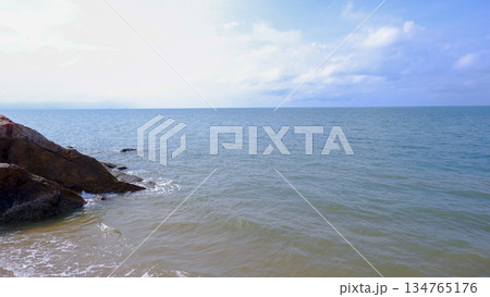 Calm Tropical Sea Surface and Distant Horizon 134765176