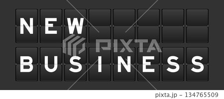 Black color analog flip board with word new business on gray background 134765509
