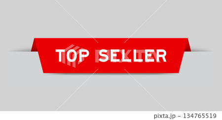 Red color inserted label with word top seller on gray background Red color inserted label with word top seller on gray background 134765519