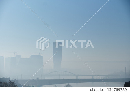 Foggy City Skyline with Bridge Foggy City Skyline with Bridge 134769789