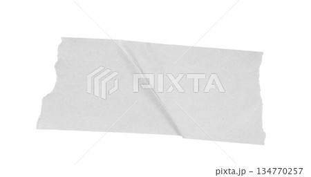 White adhesive masking tape piece with torn edges on transparent alpha channel background showing crinkled texture White adhesive masking tape piece with torn edges on transparent alpha channel background showing crinkled texture 134770257