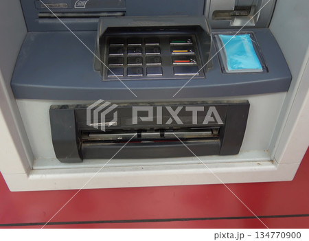 ATM for receiving funds. Hands of a man at an ATM. ATM for receiving funds. Hands of a man at an ATM. 134770900