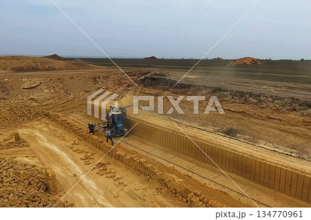 Shell quarry quarry. Cutting seashell into blocks right away in a quarry. 134770961