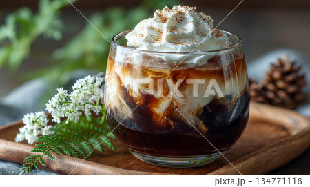 Iced coffee with whipped cream on wooden tray 134771118