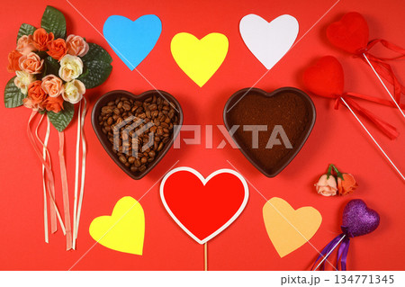 Heart coffee. Roasted coffee beans in the shape of heart on bright red background. Concept of coffee love, Valentines Day, 134771345