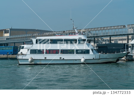 White passenger ferry moored at port terminal Venice, Italy 134772333
