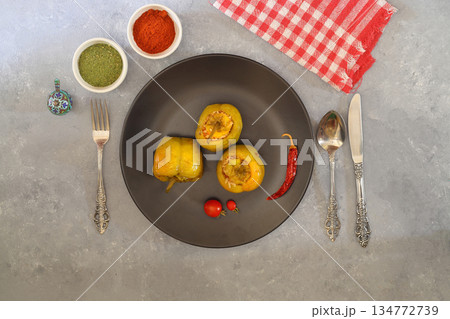 Green stuffed peppers with rice, tomatos and red hot chili pepper. Green stuffed peppers with rice, tomatos and red hot chili pepper. 134772739