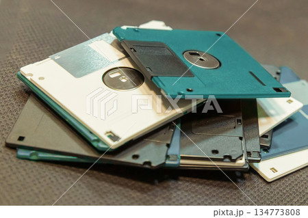 many floppy disks for storing information. symbol of storing and saving information on a computer many floppy disks for storing information. symbol of storing and saving information on a computer 134773808