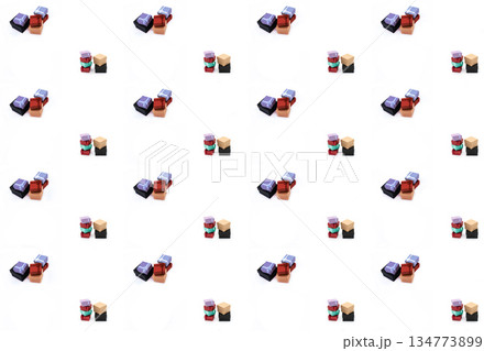 assorted gift in a multi-colored wrapper, striped, red and lilac on an isolated background assorted gift in a multi-colored wrapper, striped, red and lilac on an isolated background 134773899