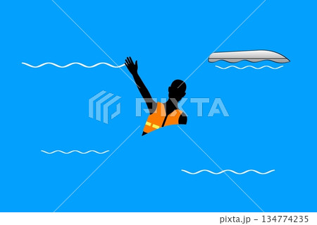 ライフジャケットを着用して救助を待つ人 134774235
