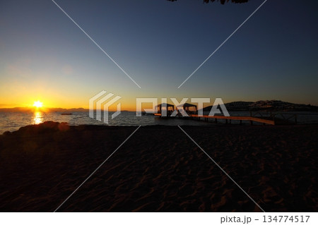 Old abandoned wooden fishing pier on the sea in the countryside 134774517